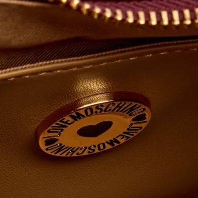 THE EMBOSSED Q HOBO BAG